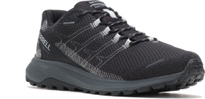 A black trail running shoe with a gray sole and reflective accents.