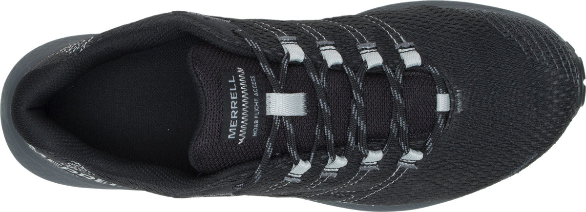 Top-down view of a black shoe with white laces.