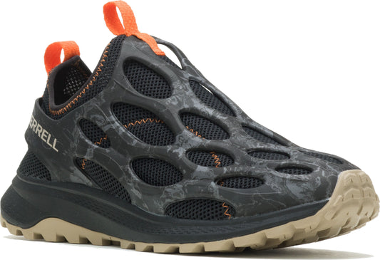 A dark gray slip-on shoe with large round openings, orange loop at the heel and tongue, and a tan sole.