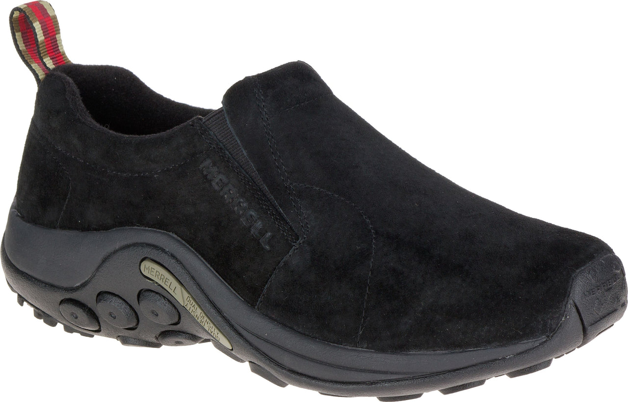 A black slip-on shoe with a thick, treaded sole and a pull tab on the heel.