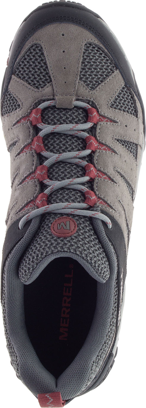 Overhead view of a sneaker with gray suede and mesh upper, gray laces and red eyelets.