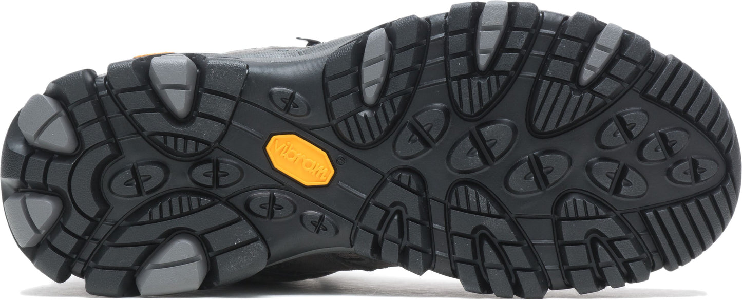 A black boot sole with orange Vibram emblem, featuring gray textured edges.