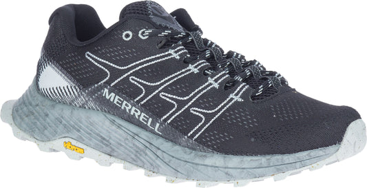 A black running shoe with white shoelaces and the brand name "MERRELL" printed on the side.