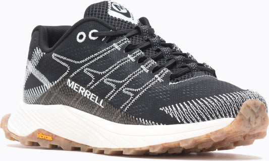 Black low-rise athletic shoe with white laces and Merrell logo, with a white sole and brown traction.