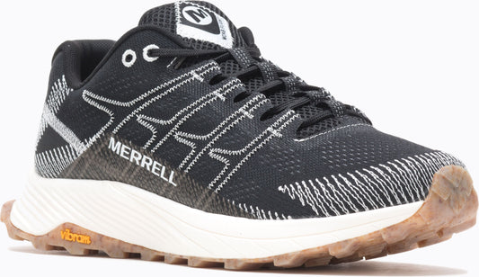 A black running shoe with white accents, low heel, white sole, and tan tread.
