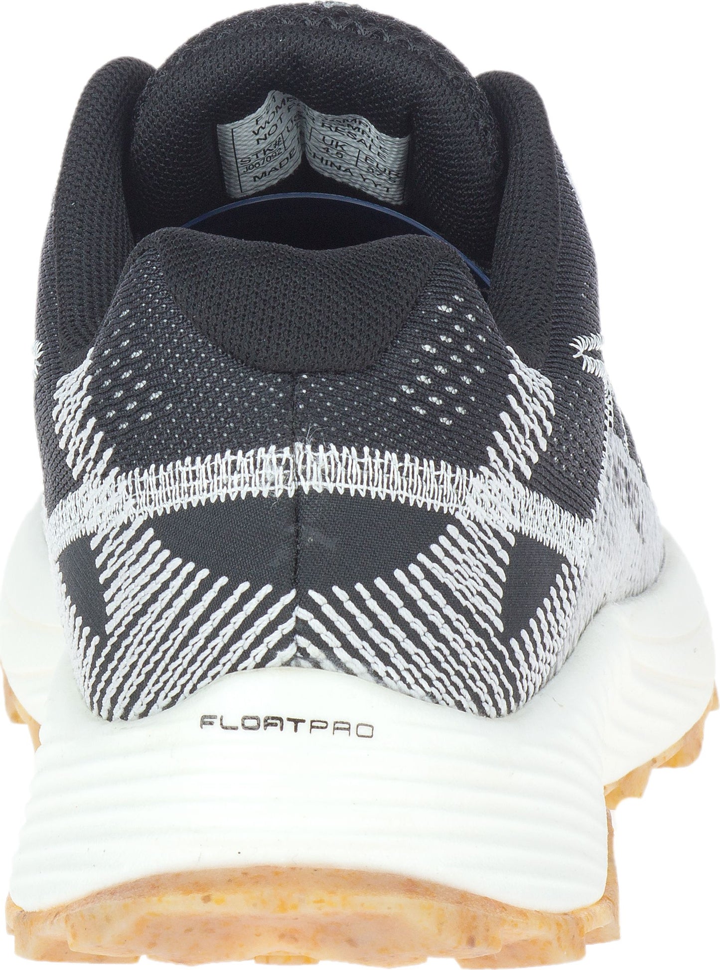 Back view of a shoe with black and white patterned upper, a white midsole marked "FLOATPRO", and a brown outsole.
