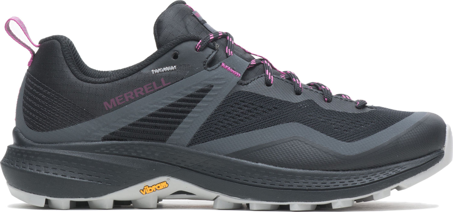 A side view of a gray and black shoe with magenta laces and pull loop.