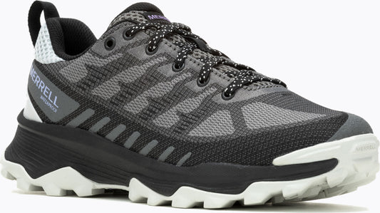 Low-cut grey and black trail running shoe with lug sole, light grey accents, and grey and black dotted laces.