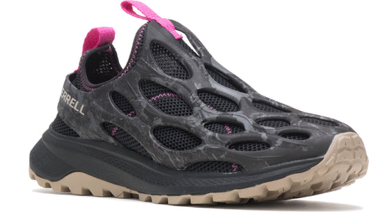 Low profile black trail shoe with beige sole, large upper cutouts, pink heel pull and accent.