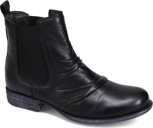 A black leather ankle-height Chelsea boot with elastic side panels and a low heel.