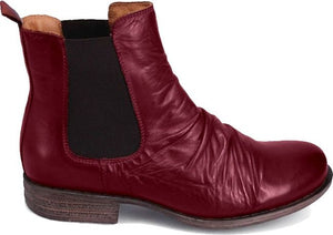 Burgundy ankle boot with elastic side panels and a low stacked heel.