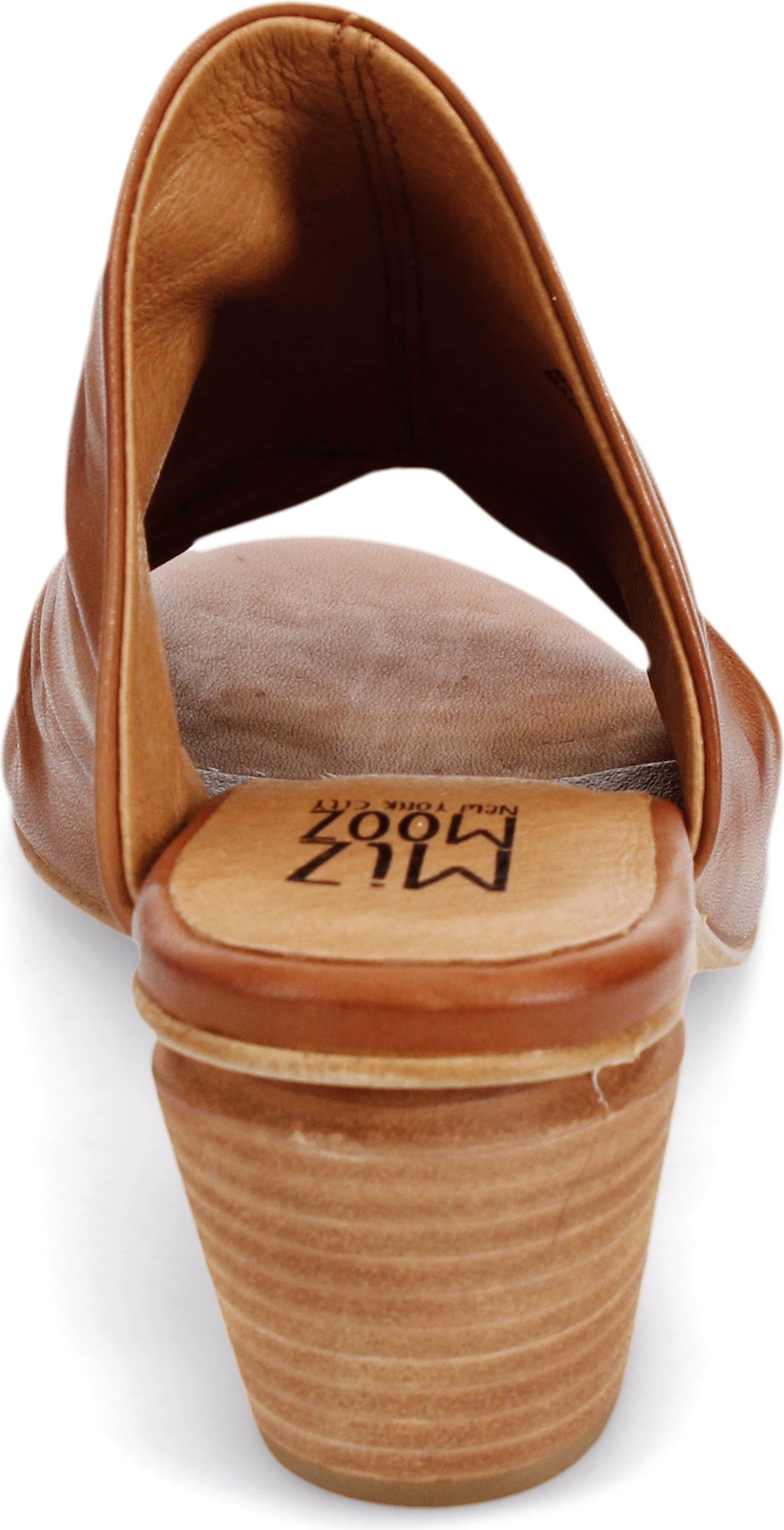 Close-up of a tan leather heeled sandal with open back and a label that reads "MLZ MOOZ".