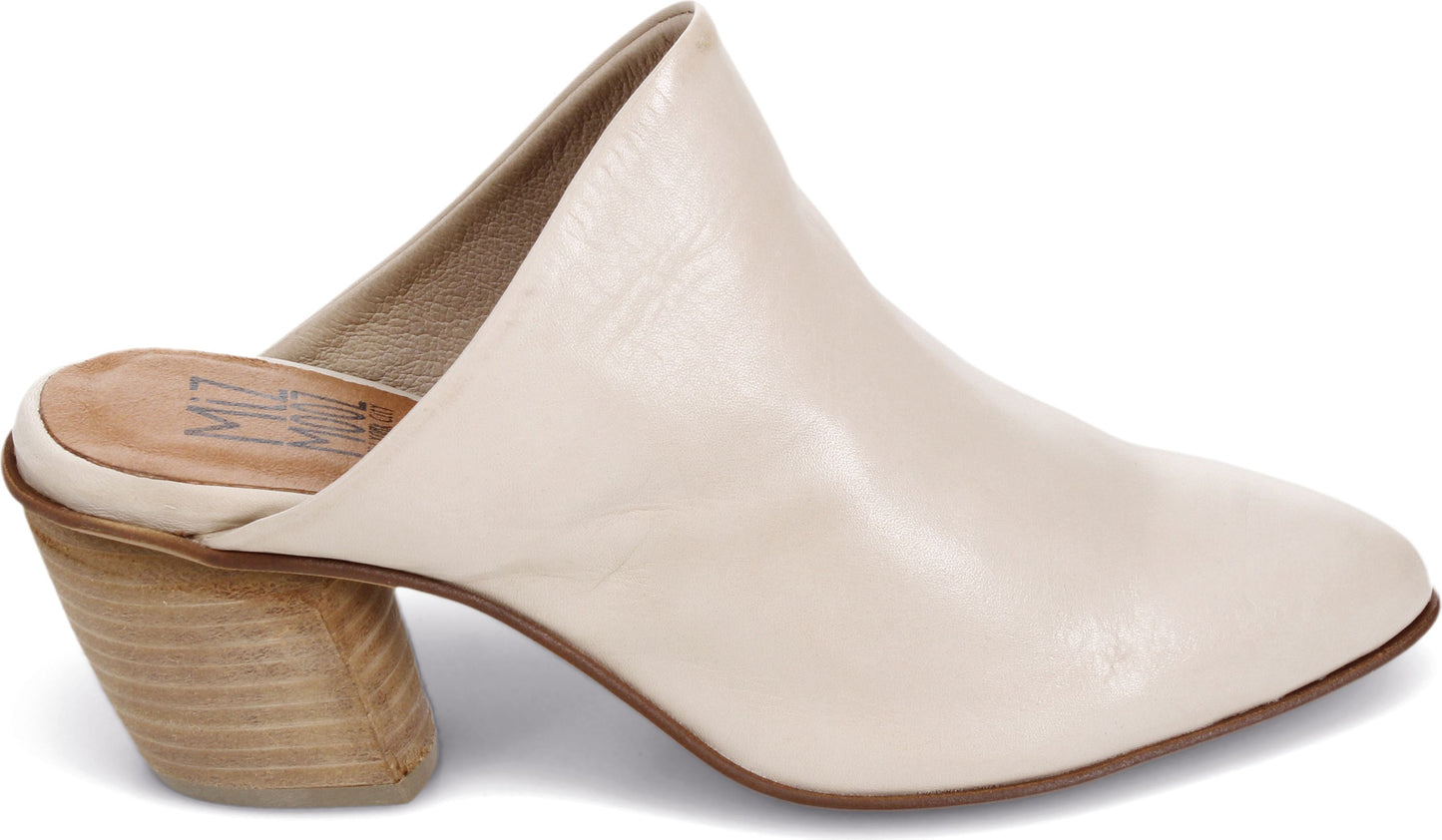 An off-white leather mule with a curved block heel.