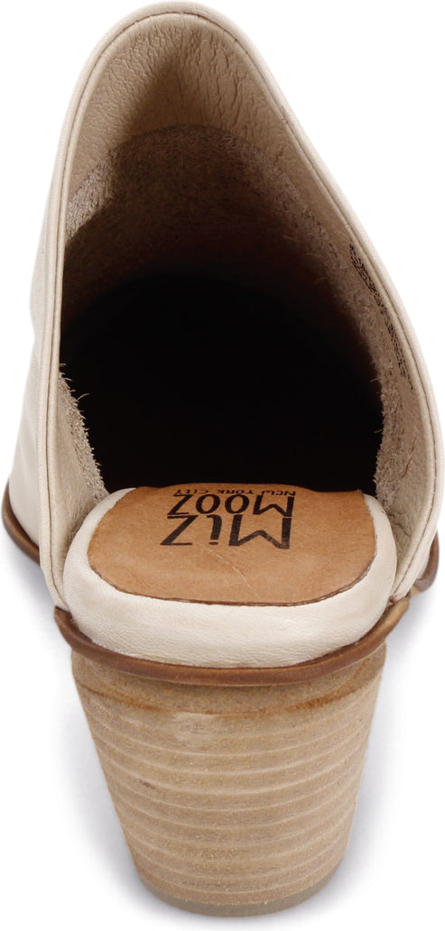 Back view of a cream-colored heeled mule shoe, showing the inside and the brand logo on the insole.
