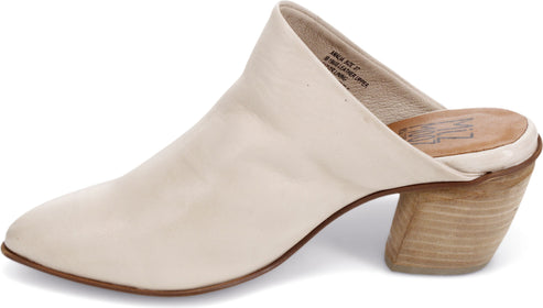 Off-white pointed mule with chunky block heel.