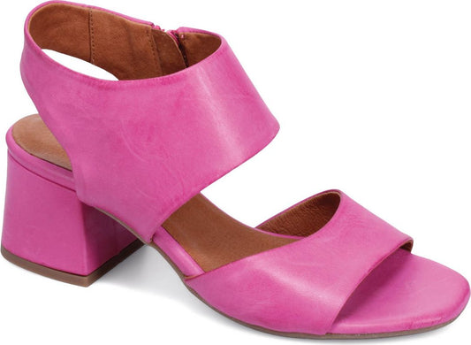 Bright pink block heeled sandals with wide straps.
