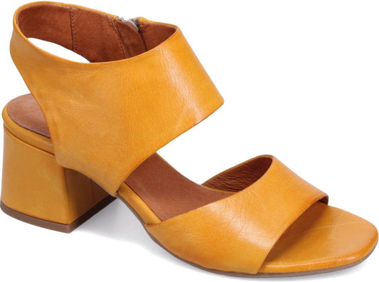 Mustard yellow leather heeled sandal with a closed heel and an open toe.