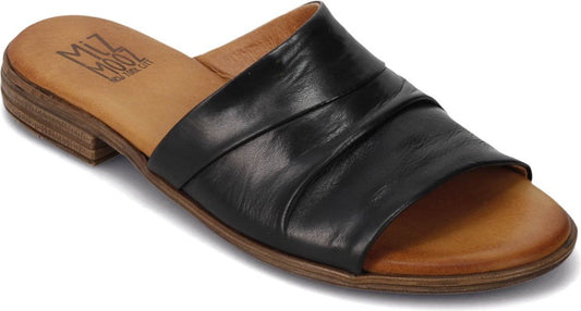 Black leather slide sandal with low heel and pleated vamp.