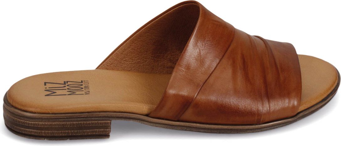 Leather slide sandal with a slight heel.