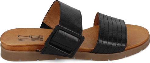 A pair of slide sandals in black, each with a wide strap. One has a large square buckle.