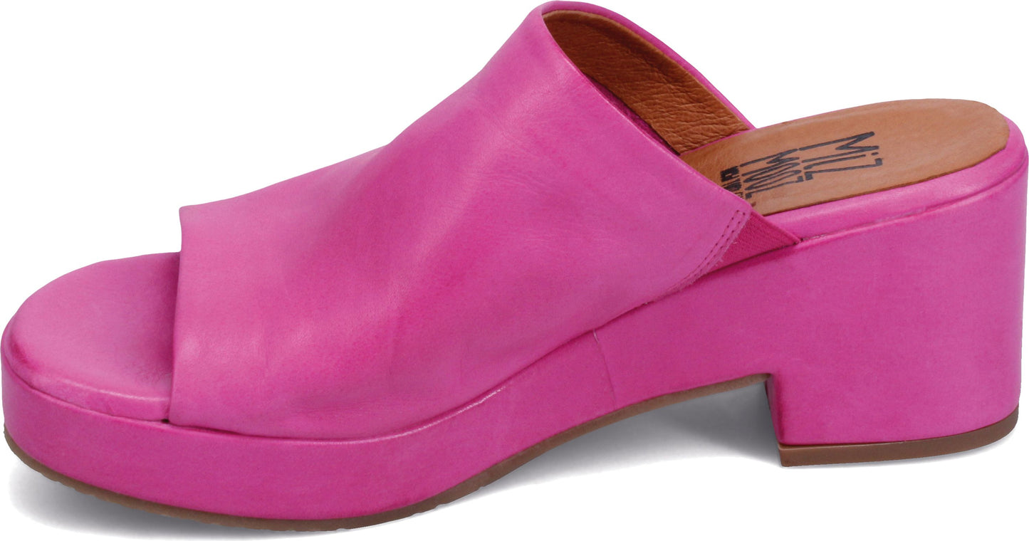 Pink platform mule with block heel.