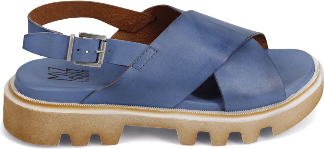 A light blue sandal with criss-cross straps and a tan platform sole.