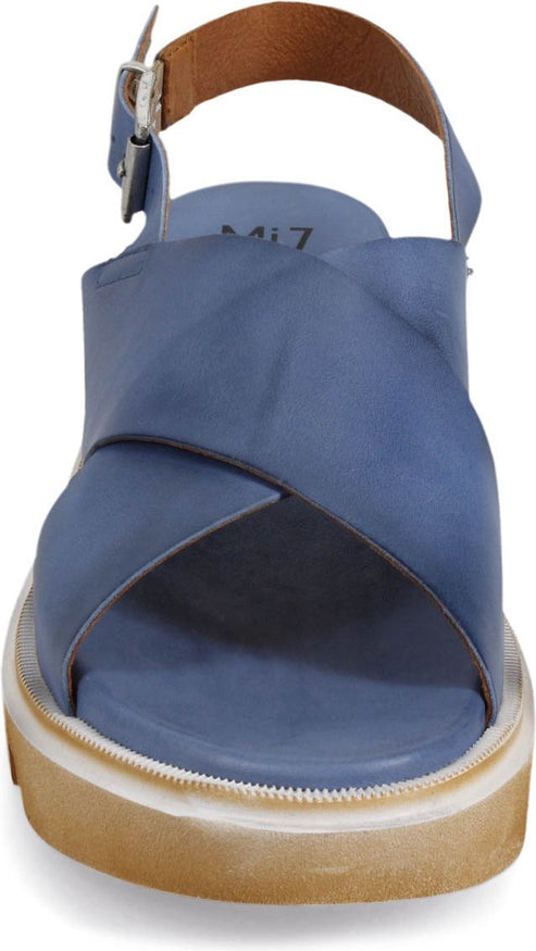 Blue leather sandal with crisscross straps and an ankle strap.