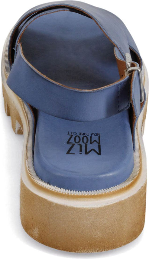 A blue sandal with a beige treaded sole featuring 'MIZ MOOZ, NEW YORK CITY' on the insole.