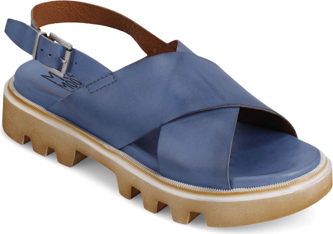 Blue sandal with cross-strap design and adjustable buckle strap on a thick lug sole.