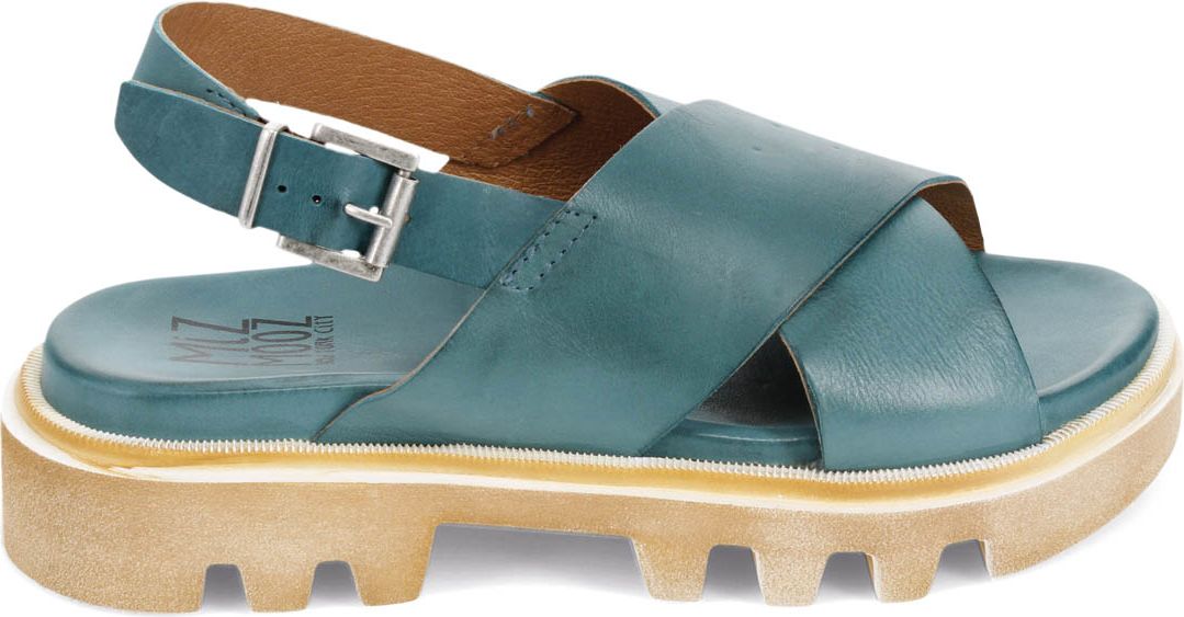 Turquoise leather sandal with thick treaded sole and adjustable ankle strap.