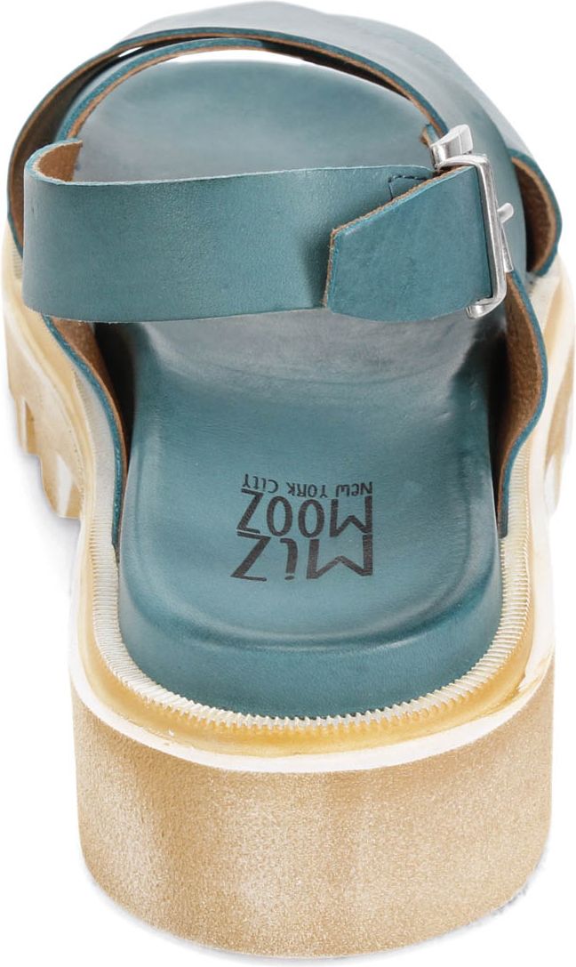Teal Miz Mooz sandal with adjustable buckle at the ankle, treaded sole, and "MIZ MOOZ NEW YORK CITY" stamped on the inner heel.