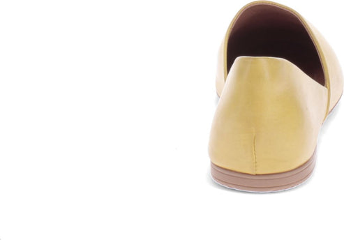 Back of a mustard-yellow flat shoe with a brown sole.