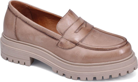 Beige leather loafer with a chunky lug sole.