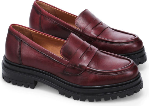 Pair of dark red leather lug-sole loafers.