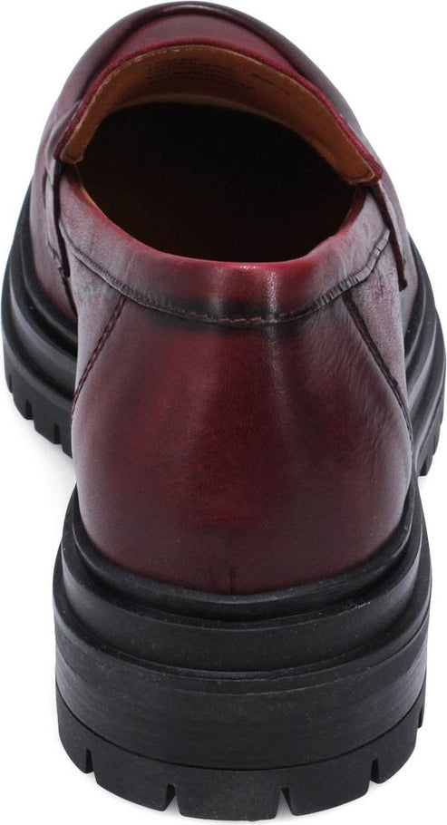 Burgundy loafer with a black lug sole.