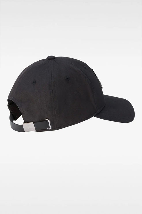 Black baseball cap, side view, adjustable strap.