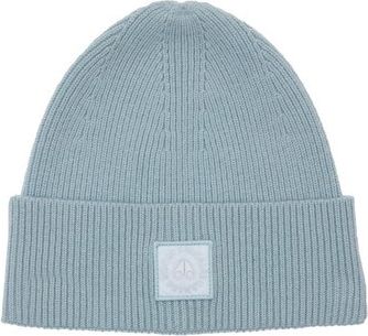 Light blue knit beanie with ribbed texture and square emblem at the front.
