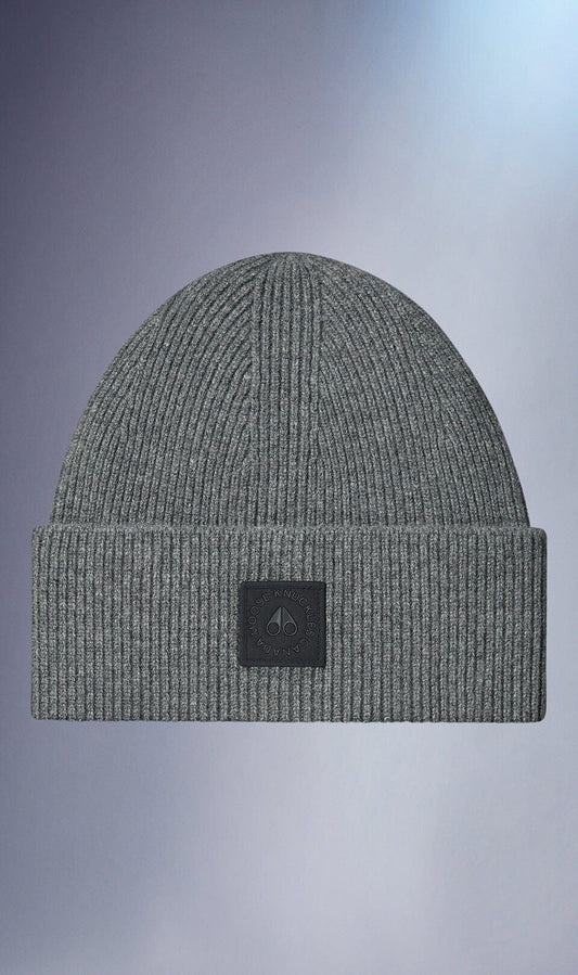 Gray knit beanie with a square black logo.