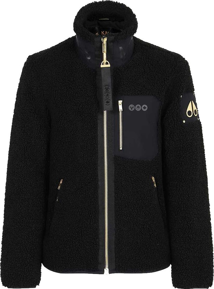 Black sherpa jacket with gold zipper and chest pocket.