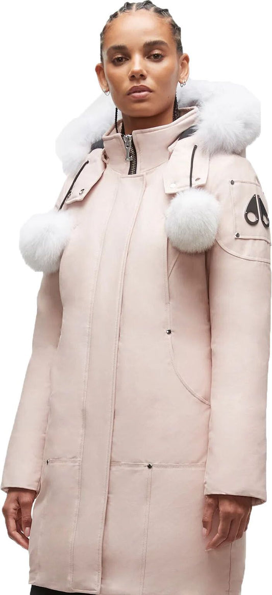 Pink parka coat with a fur-trimmed hood and two fur pom-poms at the shoulders.