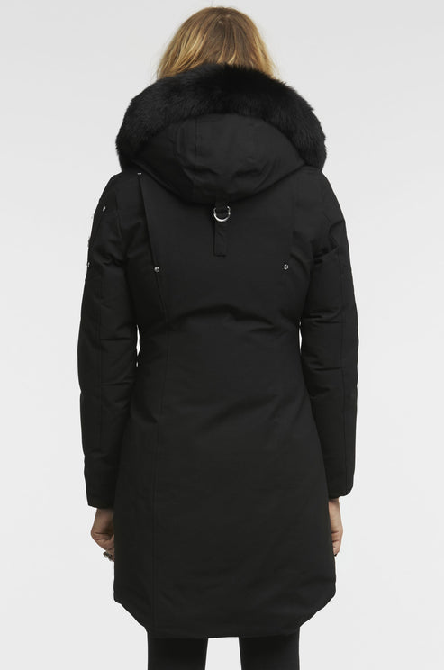 Black parka with fur hood seen from the back.