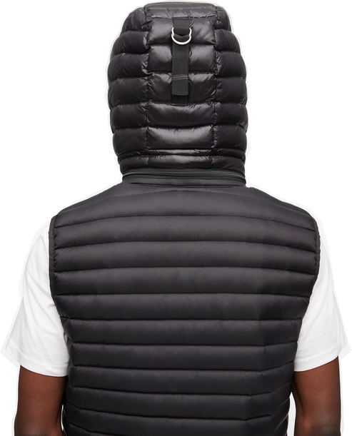 Black puffer vest with attached hood seen from the back.