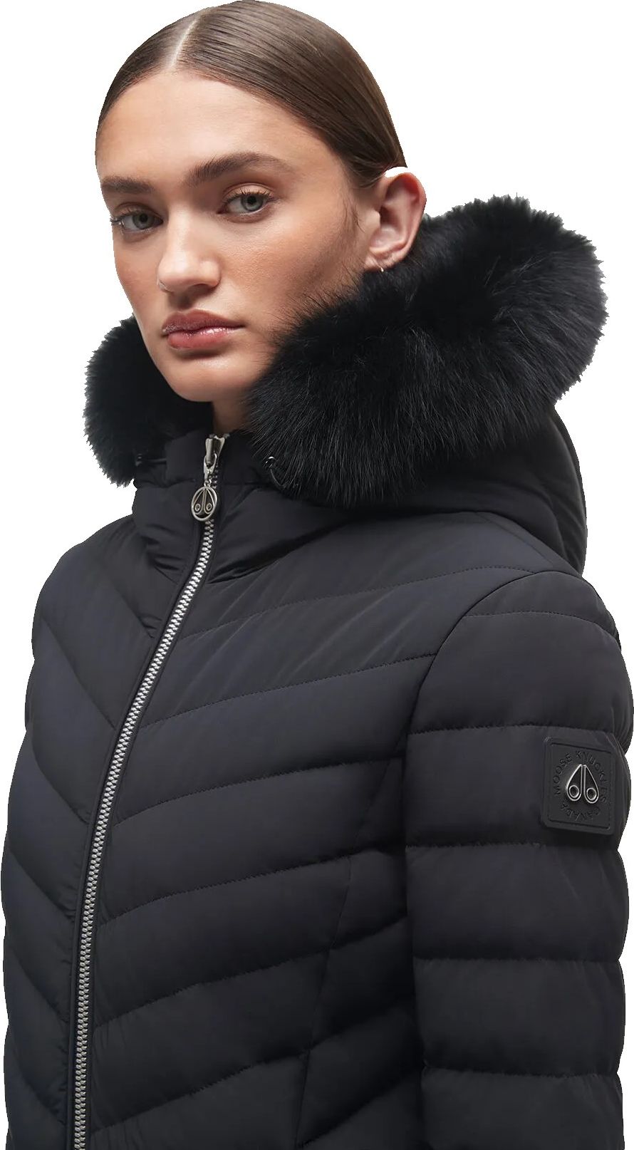 Black puffer jacket with black fur hood and zipper.