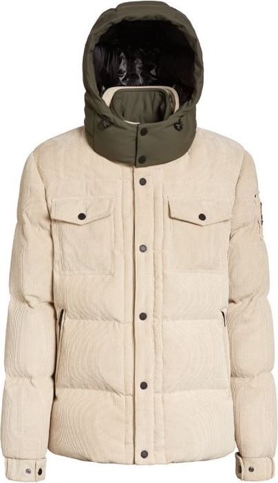 Corduroy puffer jacket in off-white with a green collar and hood and dark buttons.