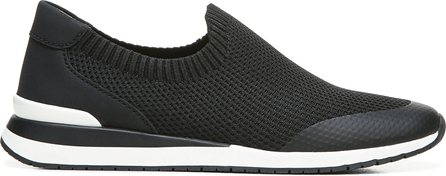 A black slip-on sneaker with a white sole.