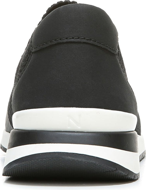 Rear view of a black and white sneaker with a mesh upper and platform sole.