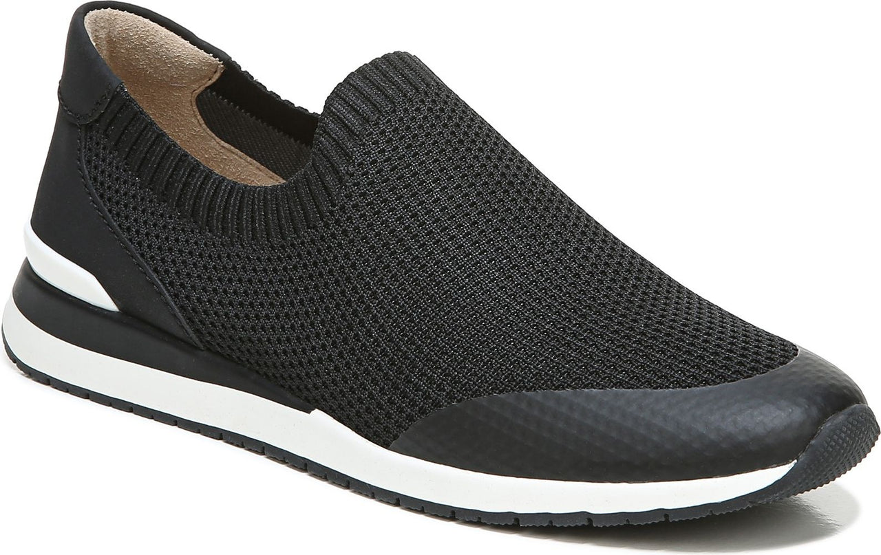 A black slip-on sneaker with a white sole.