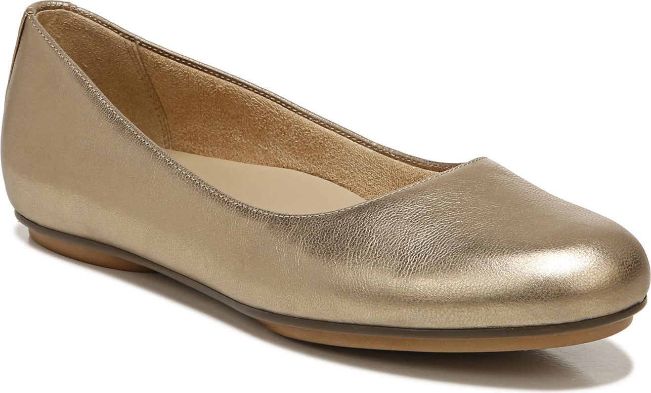 Metallic gold flat shoe with round toe.