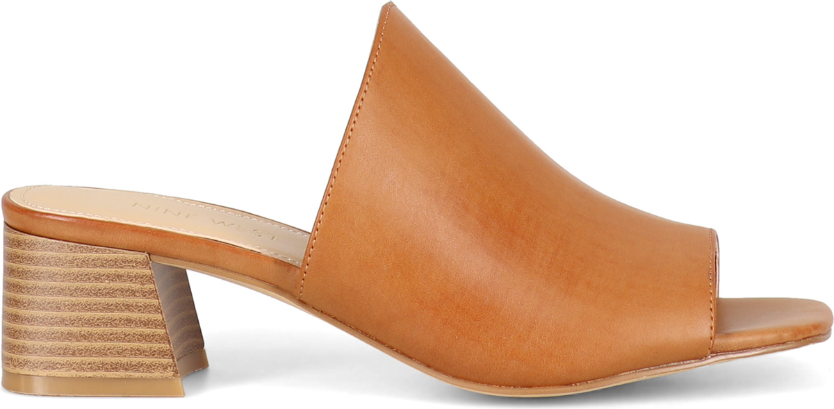 A tan leather block-heeled mule.