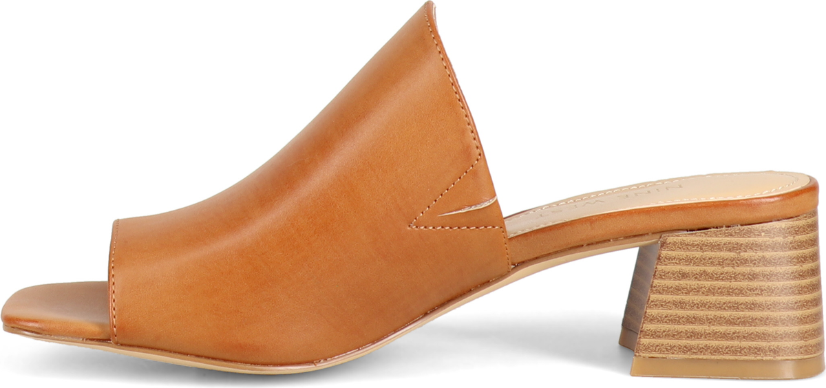 A tan-colored heeled mule with a stacked-look block heel.